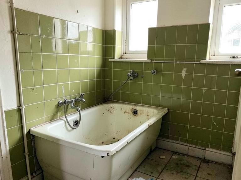 Dated bathroom before renovation